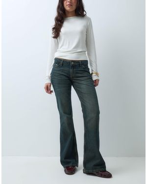 Weekday Nova jean flare slim taille basse en délavage poussiéreux foncé - Blanc