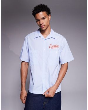 Courtside Chemise à logo imprimé avec col à revers et rayures - Blanc