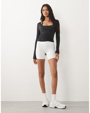 BO+TEE Long Sleeve Wrap Top - Black