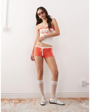 Monki Tie Waist Hotpants With Varsity Print - Pink
