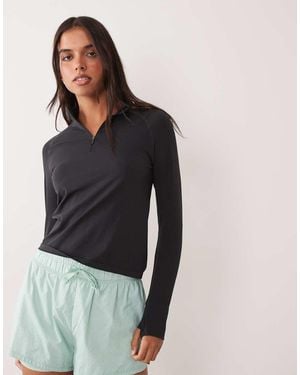 4505 Lightweight Seamless 1/4 Zip Long Sleeve Running Top - Black