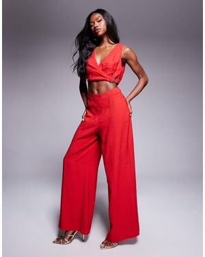ASOS Wrap Front Cut Out Jumpsuit With Buckle Detail - Red