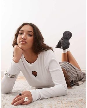 Noisy May Ribbed Long Sleeve Top With Heart Cut Out - Brown