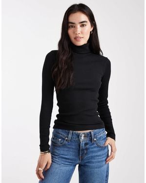 Vero Moda – langärmliges, geripptes jersey-oberteil - Schwarz