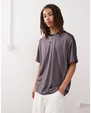 adidas Originals – adidas adicolor – t-shirt aus jacquard-jersey - Lila