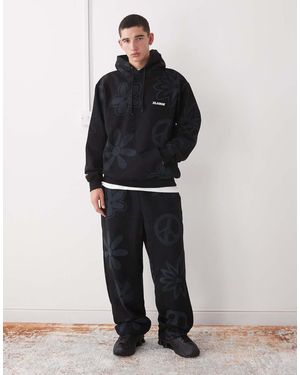 X-Large Joggers Negros Con Bajos Ajustados, Logo Y Estampado De Símbolo De La Paz De (Parte De Un Conjunto)