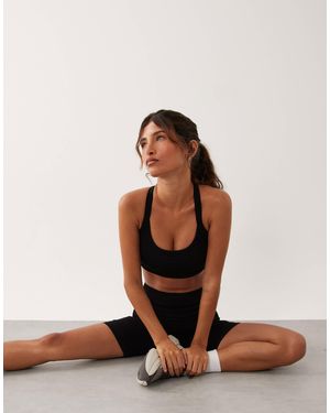 4505 Sculpting Seamless Medium Support Convertible Strap Sports Bra - Black