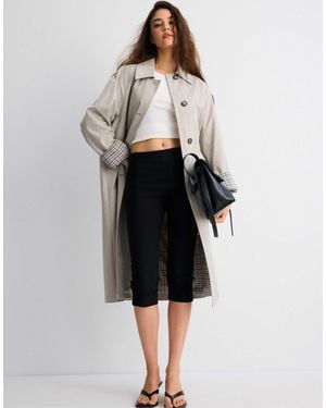 Stradivarius Karierter langer trenchcoat - Schwarz