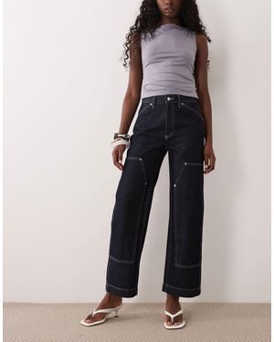 Calvin Klein Jean carpenter avec surpiqûres contrastantes en denim bleu foncé - Multicolore