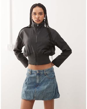 Collusion Mini-jupe en jean à taille basse - délavage clair - Bleu