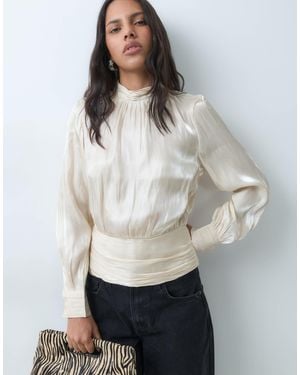 Vero Moda Top à col montant, manches longues et volants couleur champagne - Gris