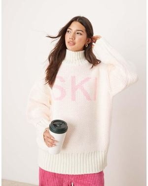 ASOS High Neck Chunky Jumper With Ski Slogan - Pink