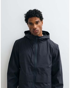 Rains Suva Hardshell Waterbestendige Lange Jas Met Capuchon - Blauw