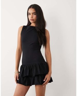 Fashionkilla Exclusive Cotton Rich Sleeveless Drop Waist Ruffle Hem Mini Dress - Black