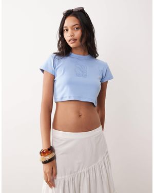 Rip Curl – knapp geschnittenes strand-t-shirt - Blau