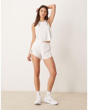 Nike Aeroswift Dri-fit Plisse Mid Rise Shorts - Natural