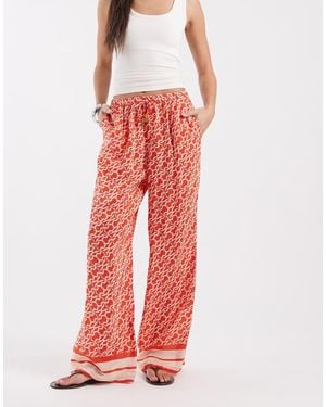 River Island Monogrammed Print Trousers - Red