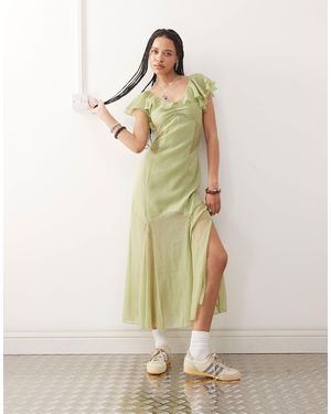 Reclaimed (vintage) Robe mi-longue avec empiècements en dentelle et manches évasées - vert pastel - Neutre