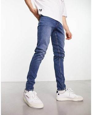 New look tapered shops jeans