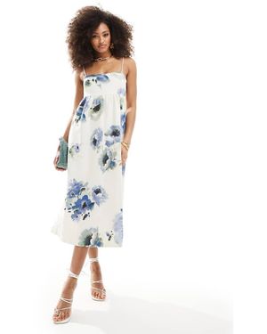 & Other Stories Midi Jurk Van Jacquard Met Spaghettibandjes, Open Achterkant En Grote Bloemenprint - Blauw