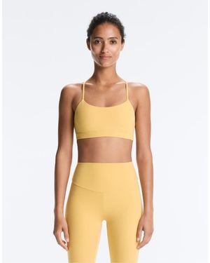 Oysho Comfortlux Light-support Sports Bra With Crossover Straps - Yellow