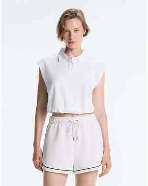 Oysho Sleeveless Piqué Cotton Polo Shirt - White