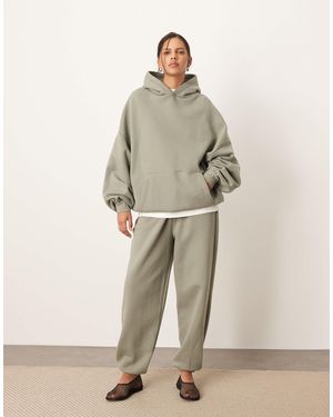 ARRANGE – oversize-jogginghose aus hochwertigem, schwerem material - Natur