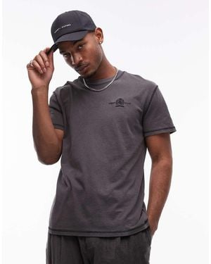 Tommy Hilfiger T-Shirt Slavato Con Logo A Stemma - Grigio
