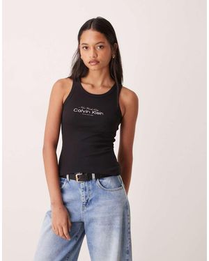 Calvin Klein Camiseta Negra Sin Mangas Con Logo Gráfico De Canalé De - Azul