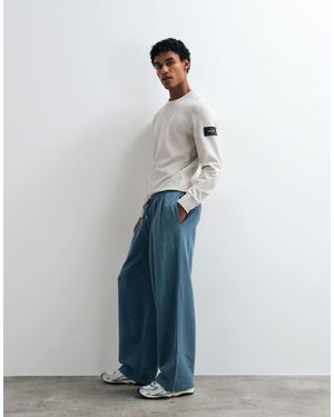 ASOS Oversized Balloon sweatpants With Acid Wash - Blue