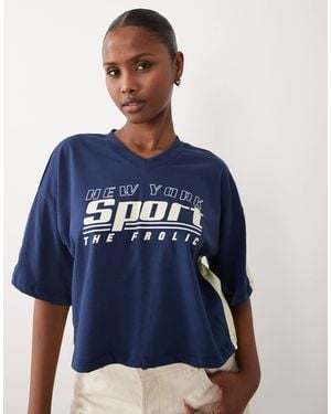 The Frolic Exclusive V-neck Graphic Front Contrast Yellow Trim Cropped Football Jersey - Blue