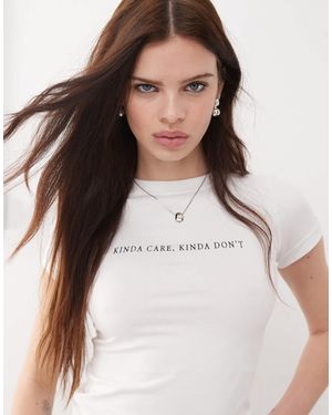 Motel Sutin Baby Tee With Don't Care Graphic - White