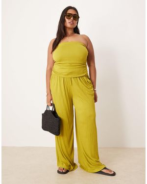 ASOS Asos design curve - pantalon large froissé noué à la taille - Jaune