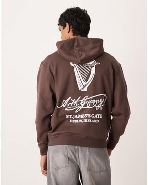 ASOS Unisex Oversized Hoodie With Guinness Print - Brown