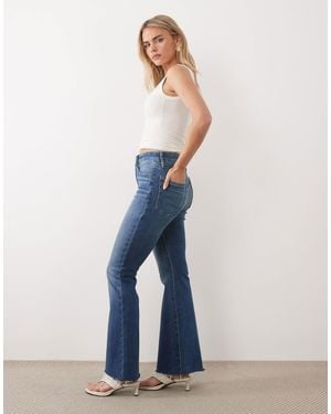 Good American Petite Frayed Hem Flare Jeans - Blue