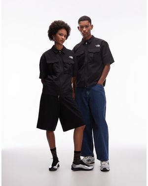 The North Face Camisa Negra De Manga Corta Con Bolsillo Con Cremallera Rager De -Negro - Azul