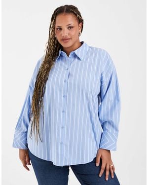 Vero Moda – gestreifte oversize-hemdbluse - Blau