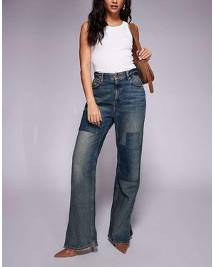 GOOD AMERICAN The Khloé Patchwork Split Hem Jean - Blue