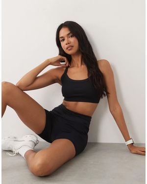 4505 Nahtloser baby-rib racerback-sport-bh mit verstellbaren trägern - Schwarz