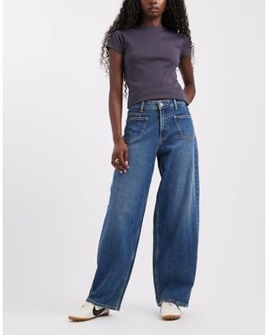 Vero Moda Zelda High Rise Barrel Leg Jeans With Pocket Detail - Blue