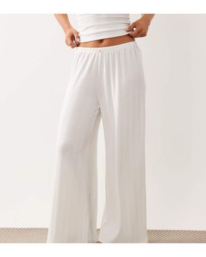 ASOS Asos Design Petite Pointelle Wide Leg Pyjama Trousers With Rosebud Trim - White