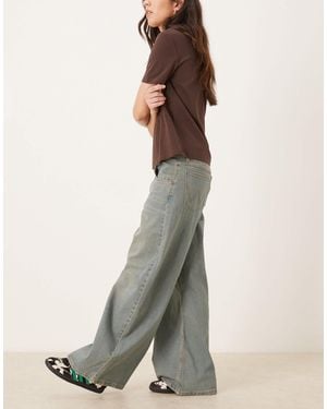 Wrangler Jean barrel taille basse délavage moyen - Bleu