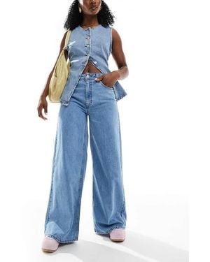 ASOS Jeans Morbidi A Fondo Ampio Liscio - Blu