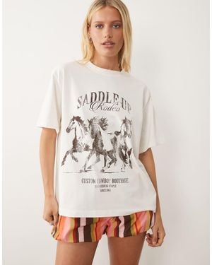ASOS Oversized T-shirt With Saddle Up Rodeo Graphic - White