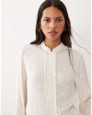 Mango Hoogsluitende Jacquardblouse Met Lange Mouwen En Knoopdetails - Naturel