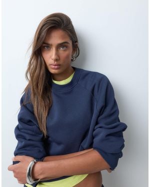 ASOS Sweat regular à manches raglan en molleton gratté marine - Bleu