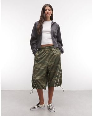 Collusion Xl baggy-longline-nylon-shorts im military-muster - Mehrfarbig