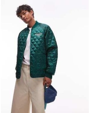 Carhartt Alumni - veste matelassée avec logo brodé - Vert