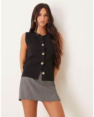 Mango Knitted High Neck Vest With Gold Buttons - Black