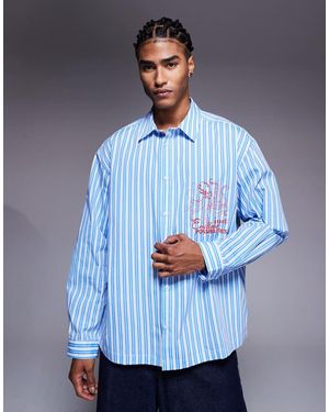 ASOS Ruimvallend Gestreept Overhemd Met Borduursel Op De Borst - Blauw